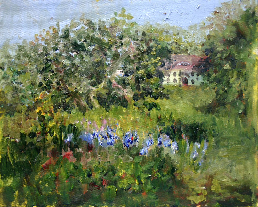 Plein air painting with field, trees and house