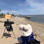 Painter on the beach